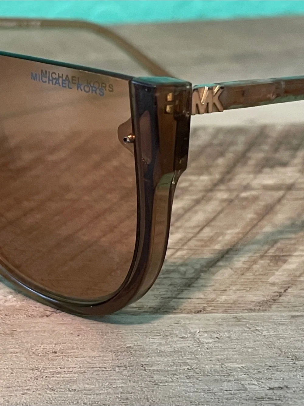 Michael Kors Unisex MK2151 Aspen Amber Rimless Shield Sunglasses